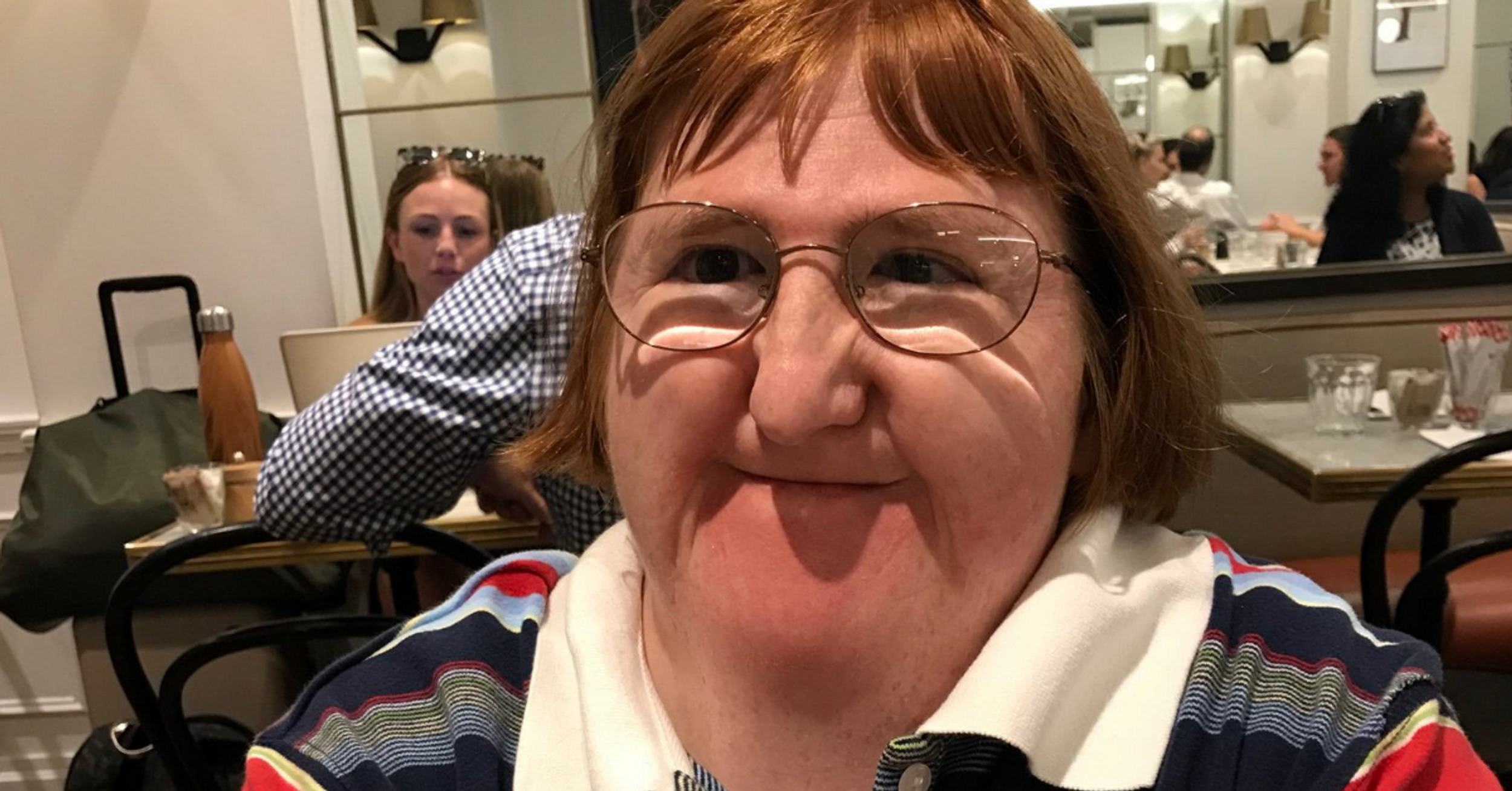 Disabled Writer Goes Viral After Combating Online Trolls' Mean Comments With Cheerful Selfies
