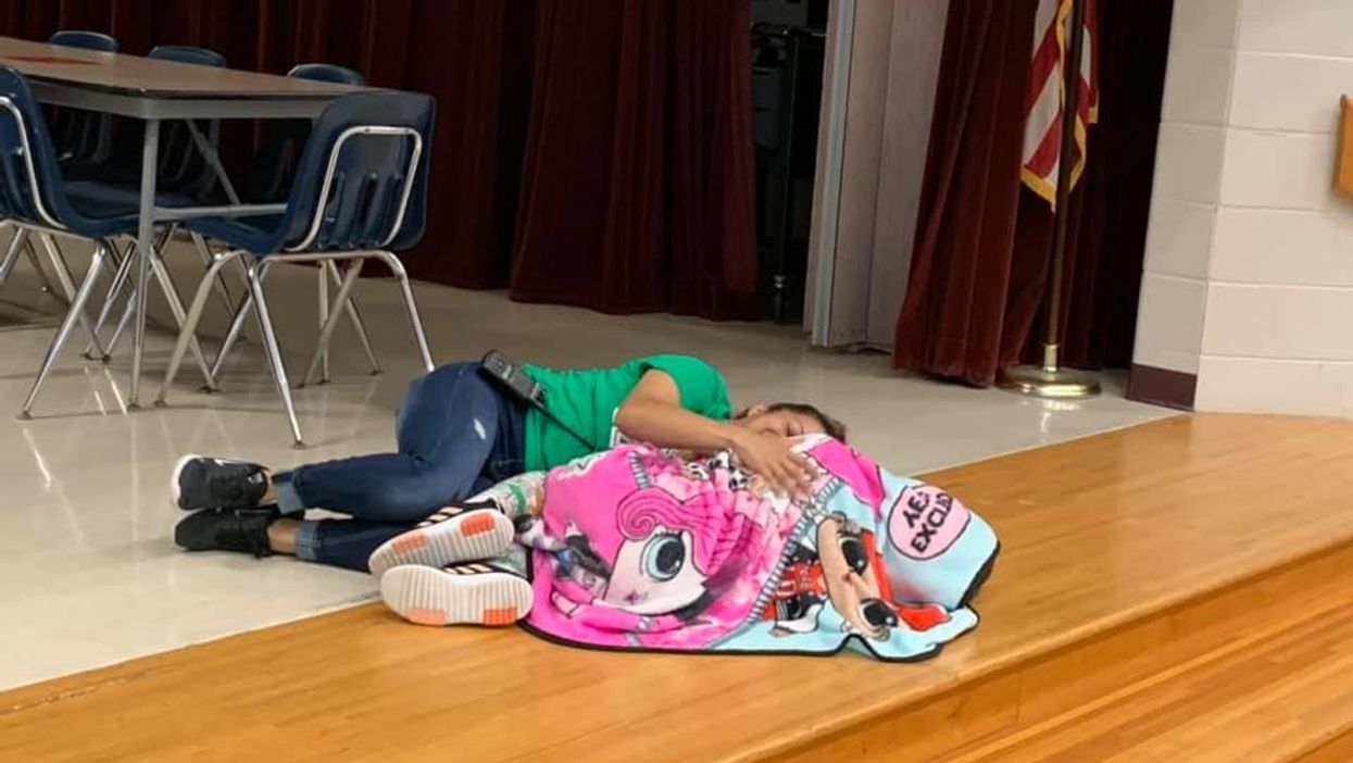 A texas custodian comforted an autistic student during a rough day