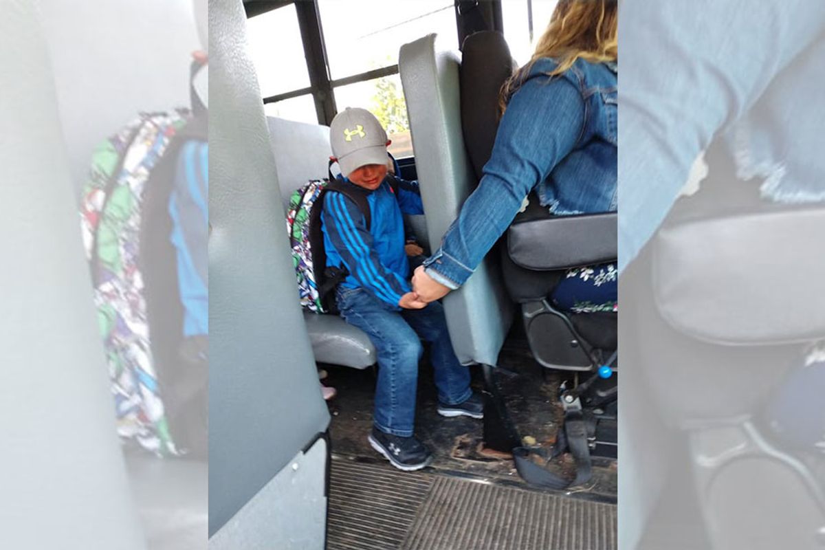 Bus driver comforts scared boy on his first day of kindergarten in heartwarming photo