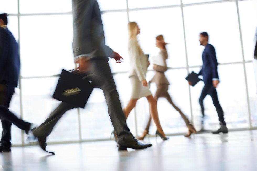 Employee rush to get to work early.