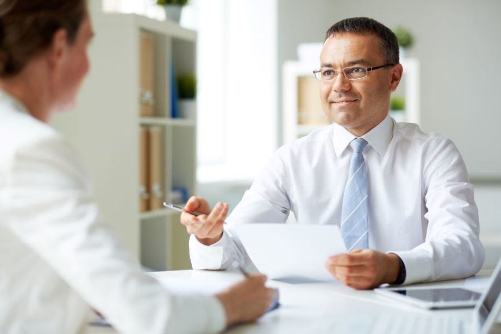 Man selling his skills during an interview with his dream job.