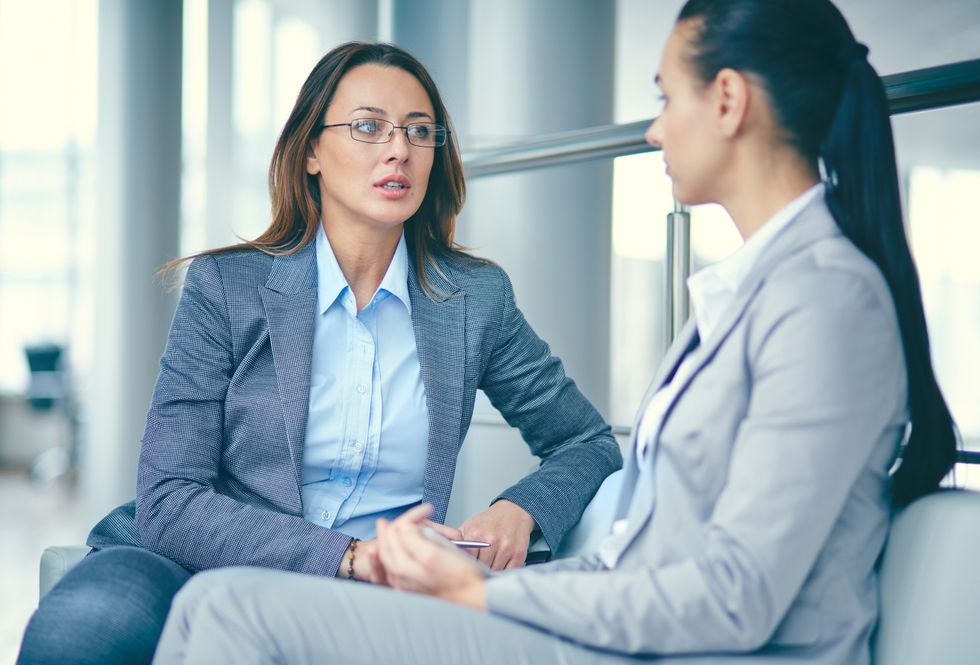 Female executive building personal brand to include on resume