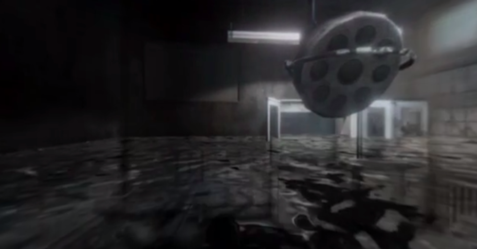 A room almost completely submerged in water with a shower head looming in front