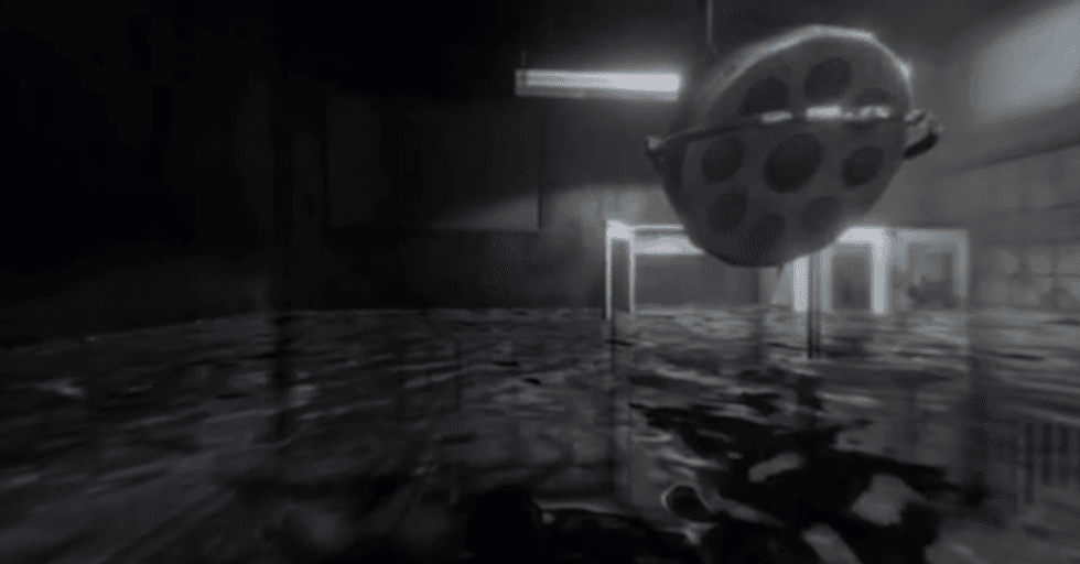 A room almost completely submerged in water with a shower head looming in front