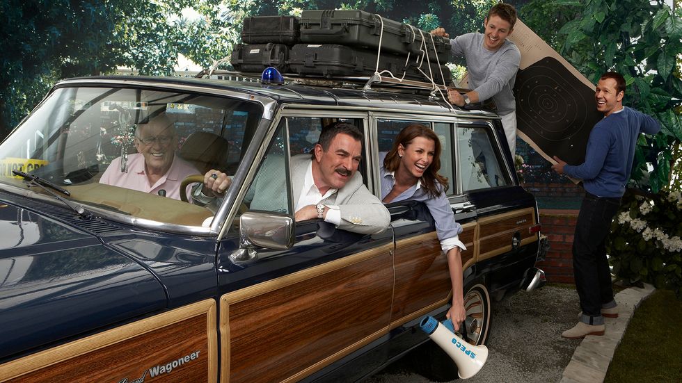 Cast of Blue Bloods in station wagon