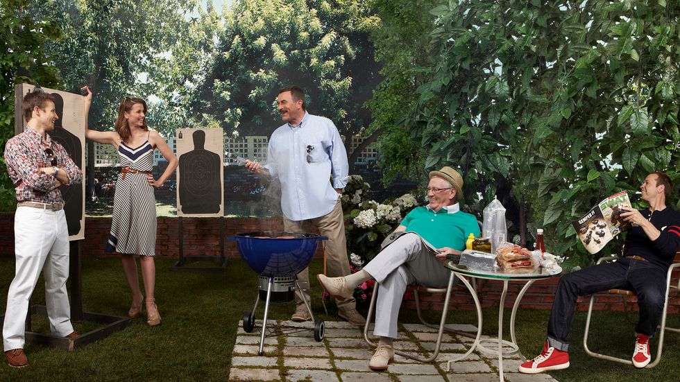 Cast of Blue Bloods grilling in backyard