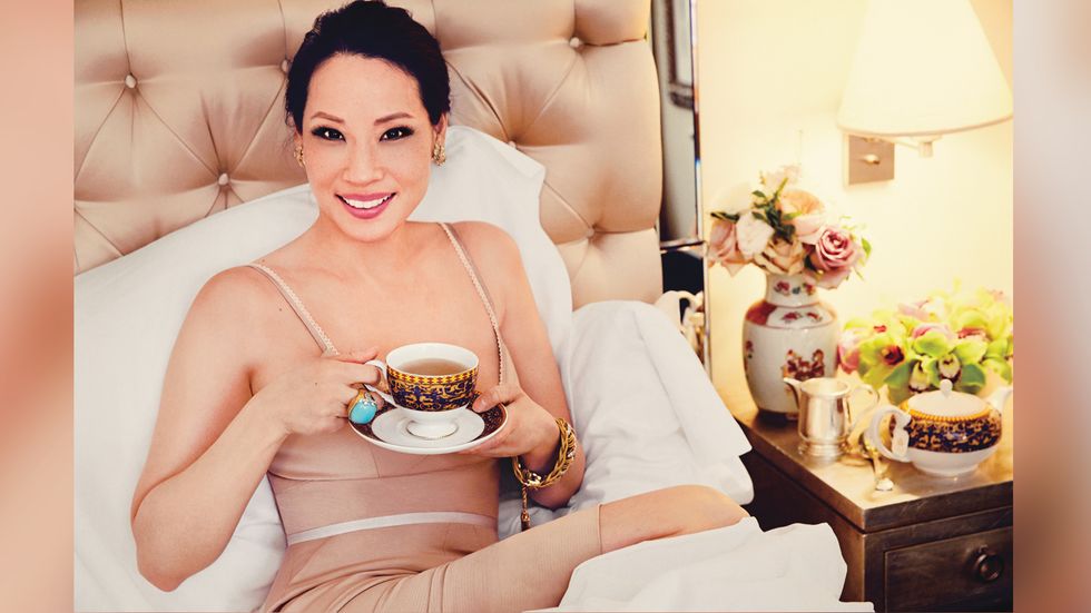 Lucy Liu of Elementary drinking tea in bed