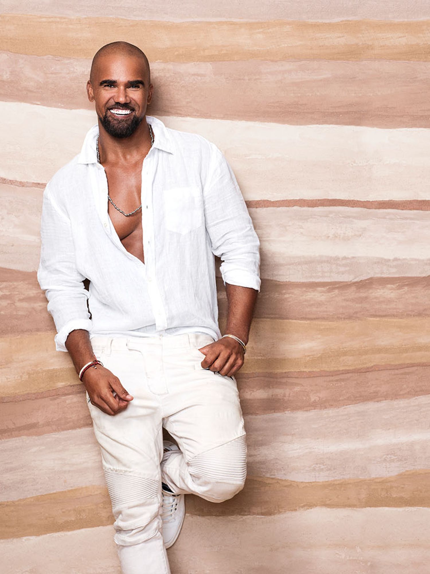 Shemar Moore of SWAT in all white ensemble