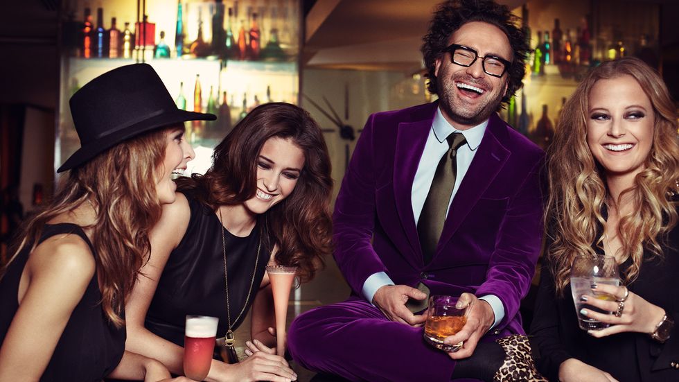 Johnny Galecki laughing with friends