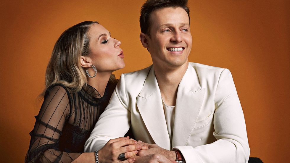 Vanessa Ray and Will Estes in white suit