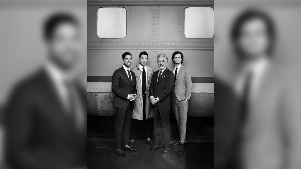 Adam Rodriguez Daniel Henney Joe Mantegna and Matthew Gray Gubler standing in front of a train