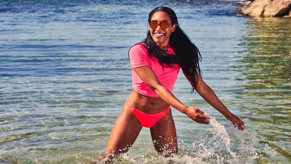 Candice Patton in pink bikini