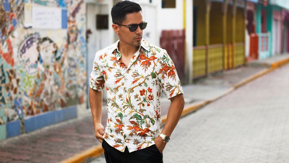 Jay Hernandez of Magnum PI in flowered shirt in Mexico