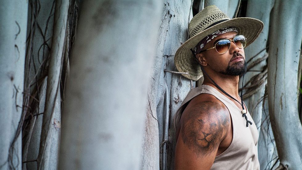 Shemar Moore of SWAT in a tank top and sunglasses