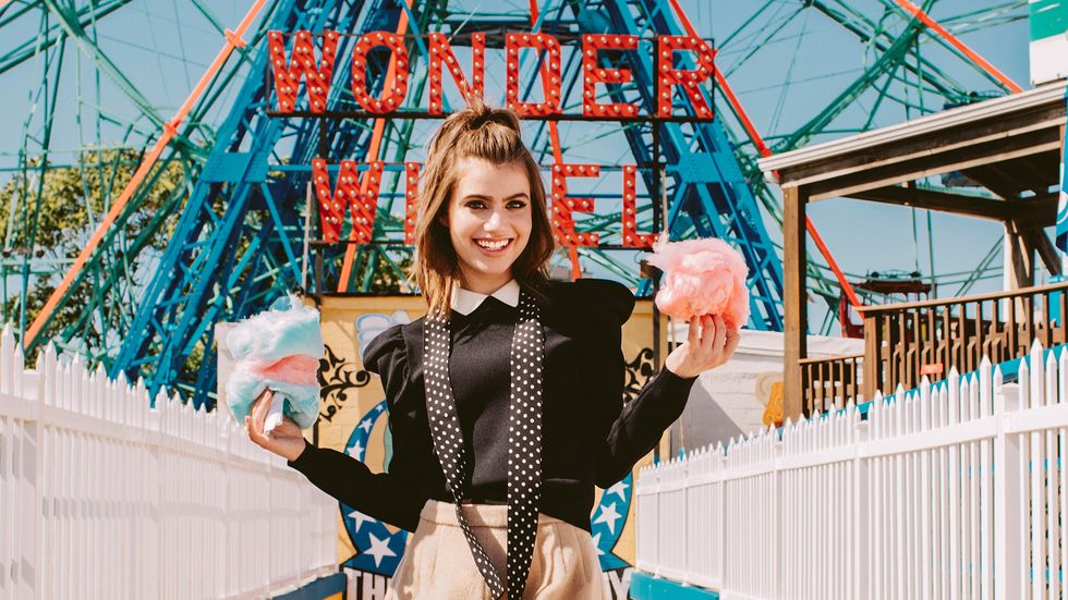 Sami Gayle of Blue Bloods holding cotton candy