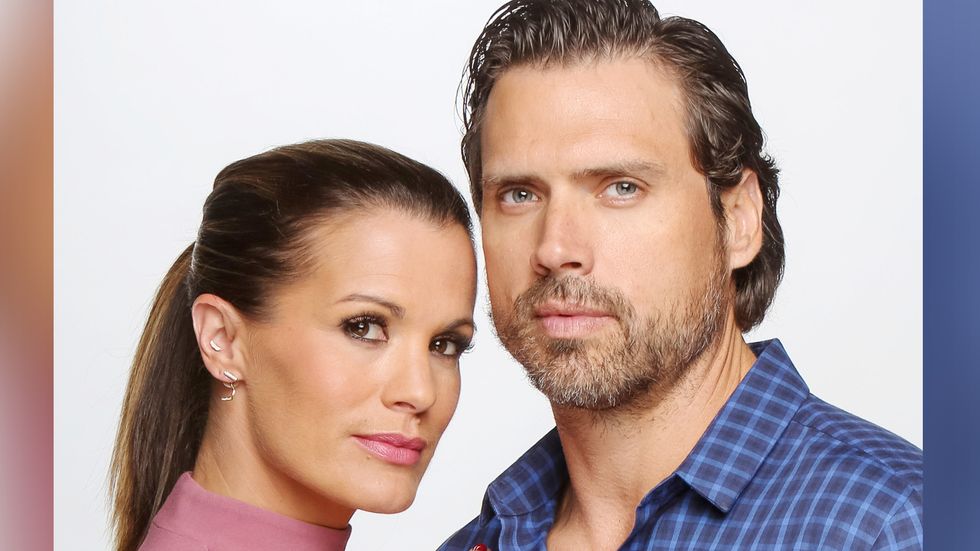Melissa Claire Egan and a cast mate look piercingly at the camera.