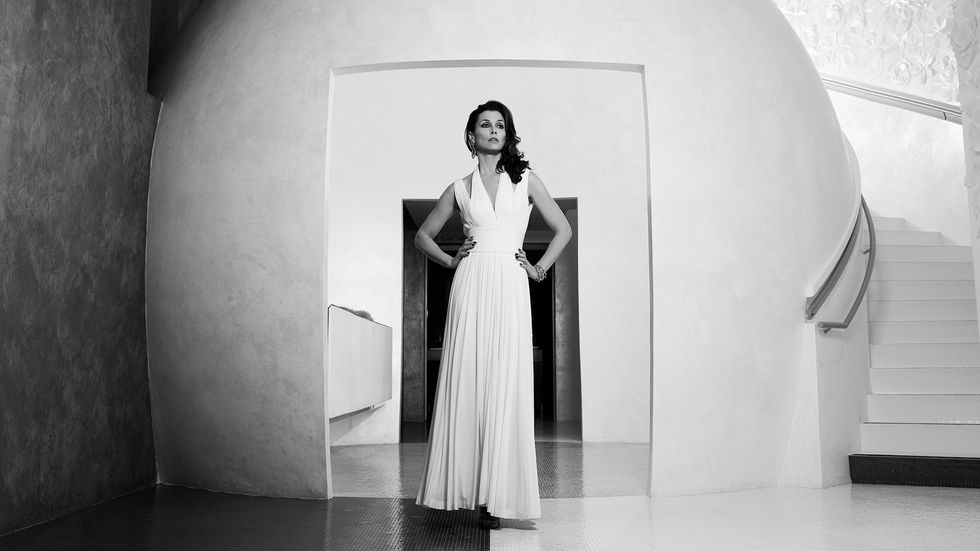 Bridget Moynahan in long white dress