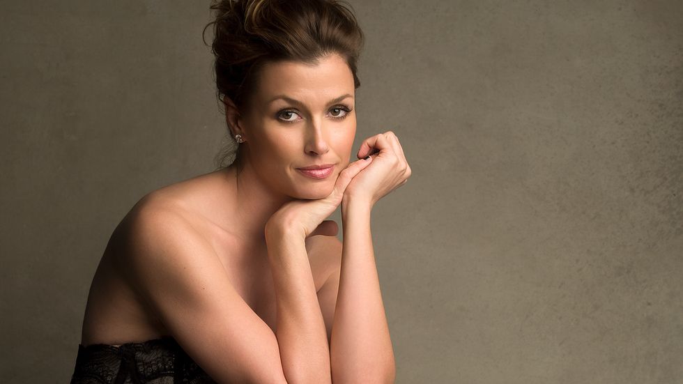 Bridget Moynahan in black lace outfit