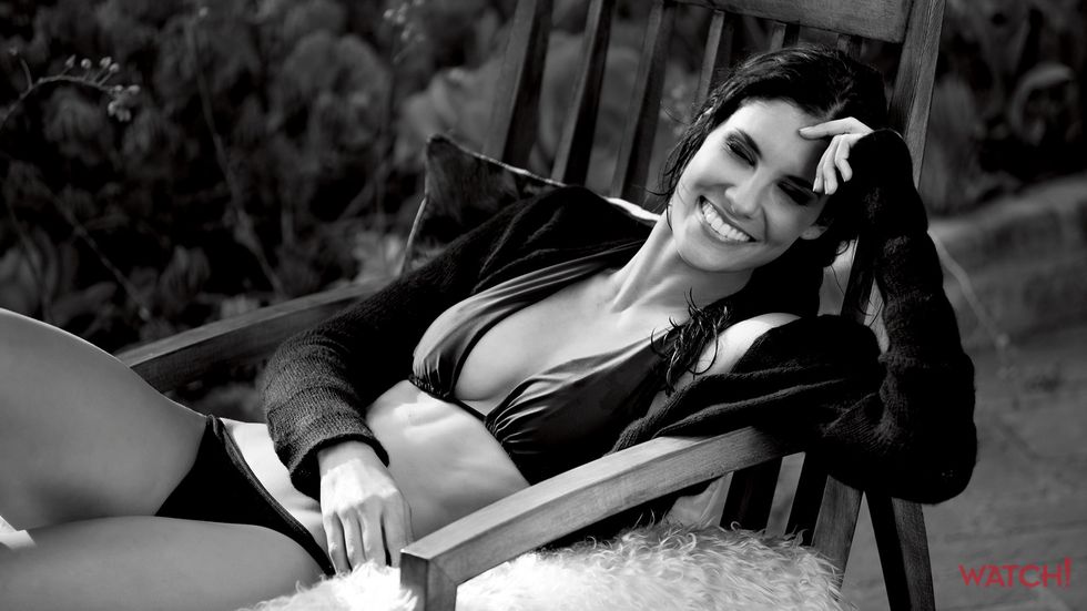 Daniela Ruah of NCIS Los Angeles in black bikini and sweater