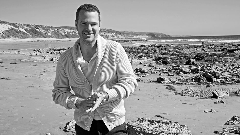 Chris O'Donnell on a rocky beach