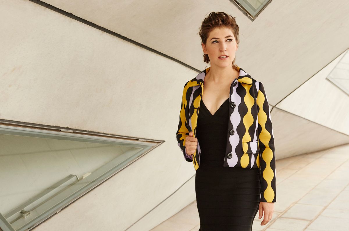 Mayim Bialik of The Big Bang Theory in mod black white and yellow blazer