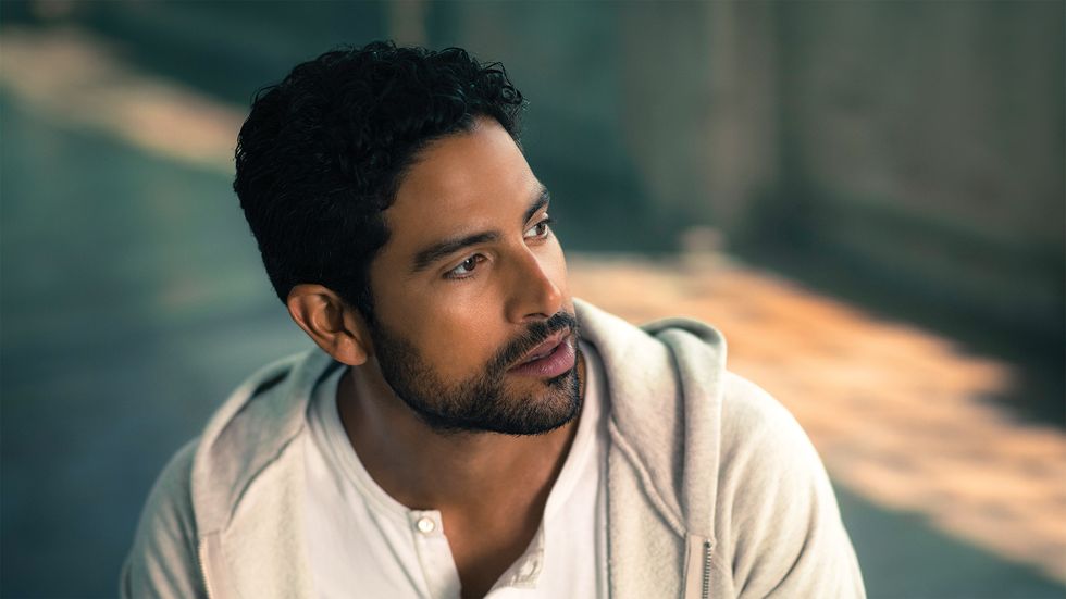 Adam Rodriguez in ivory hoodie