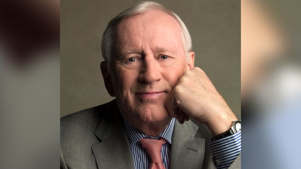 Len Cariou close up in grey suit