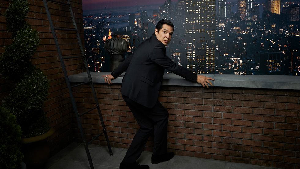 Nathaniel Arcand in front of New York City scene