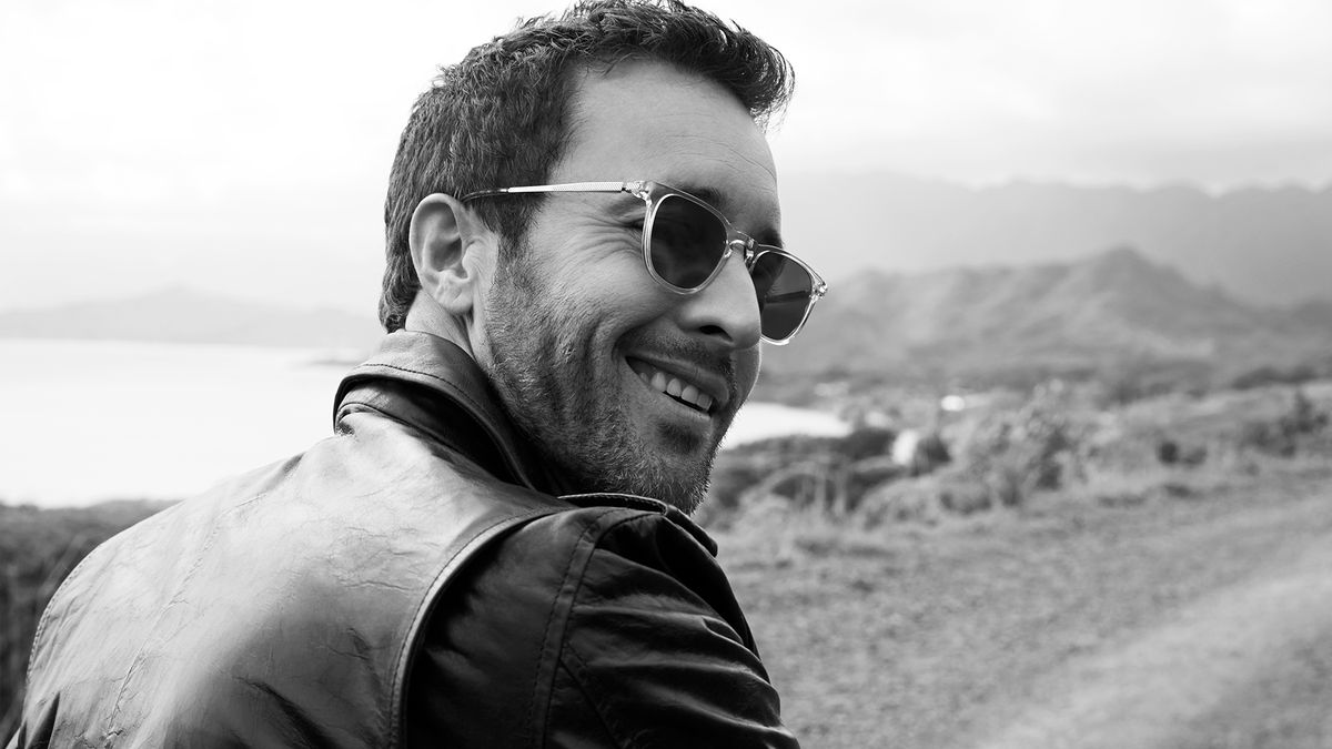 Alex O'Loughlin in black leather jacket and sunglasses