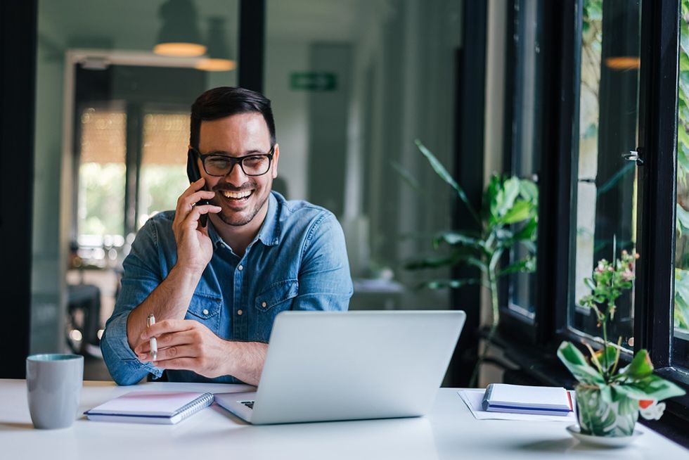 Young professional man gaining emotional intelligence and getting more confident at work.
