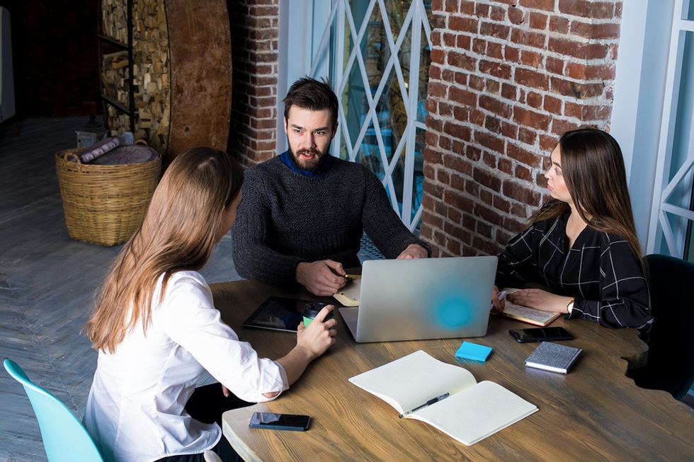 Employee talks to her bosses about taking on more job responsibility.