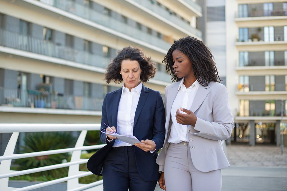 Employee talking with boss before getting a promotion