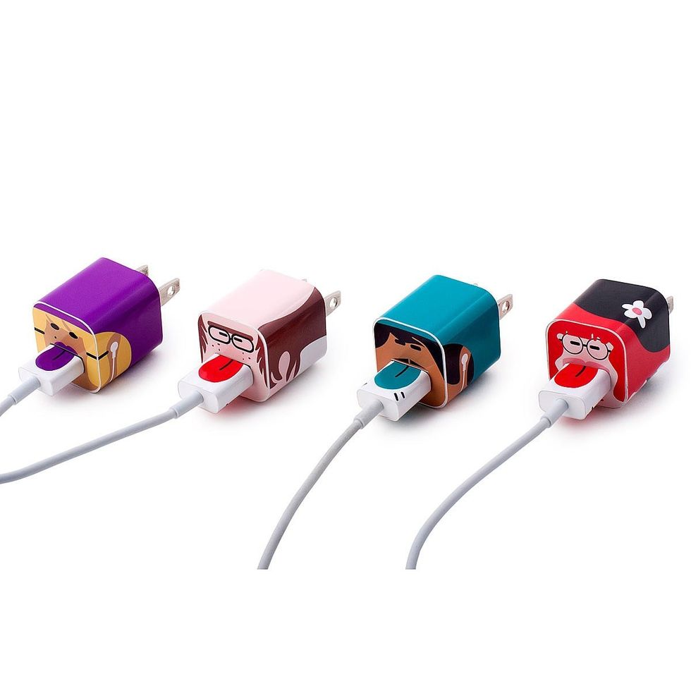 Chargers and USB cables with colorful stickers turning them into silly faces