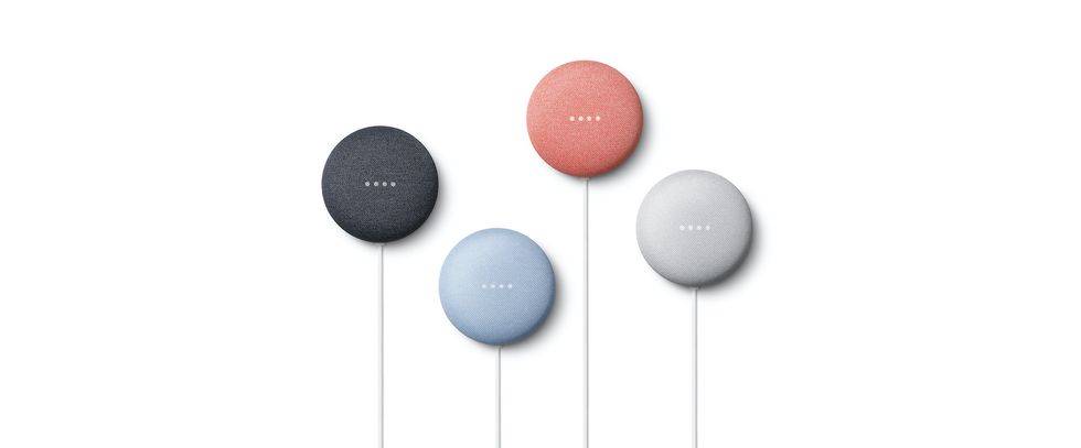 Four Nest Mini home speakers in coral, blue, gray and black