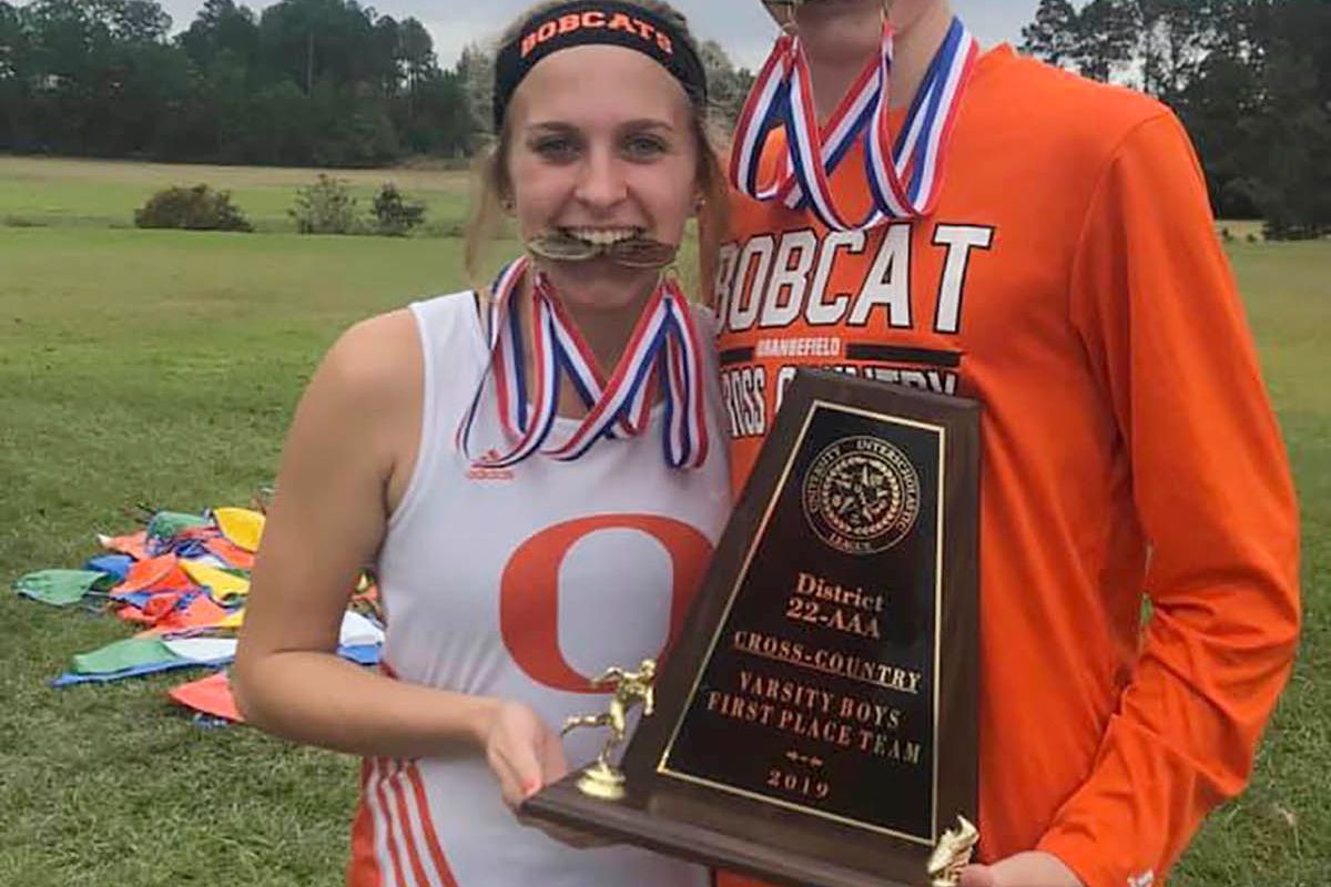 Bobcats have big day at District CC Meet; Helm, Wrinkle nab first-places
