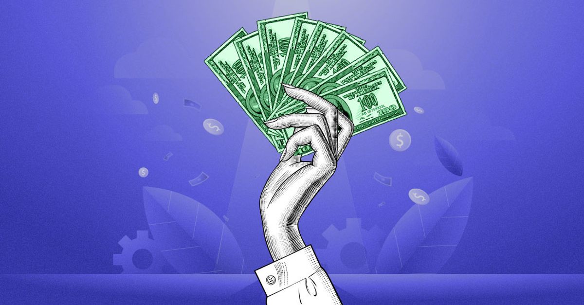 A person contemplating "what is a good salary?" as they hold money in the air
