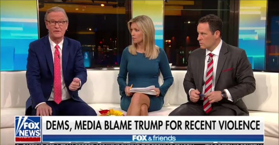 'Fox & Friends' Hosts Are Getting Dragged for Their Questionable Reasoning for Why Donald Trump Doesn't Deserve Any Blame for the Pittsburgh Synagogue Shooting