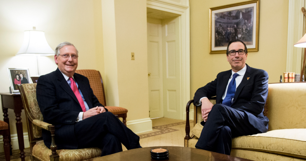 Pictures of Mitch McConnell and Trump's Treasury Secretary Posing In Front of a Wall of Gold Bars Just Emerged Online, and the Internet Is Having a Field Day