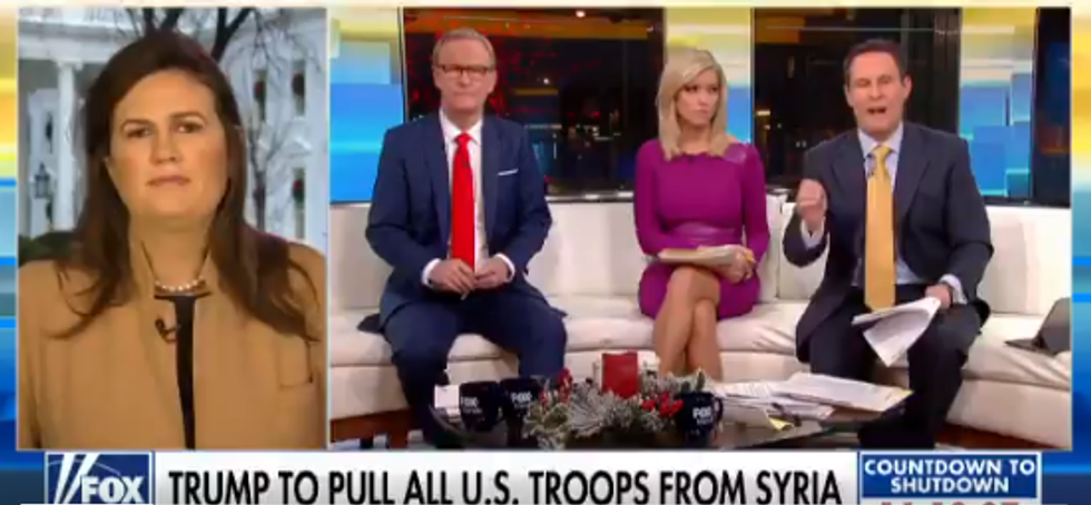 'Fox & Friends' Host Just Threw Donald Trump's Claim That 'Barack Obama Founded ISIS' Back in Sarah Sanders' Face, and It Was Savage AF