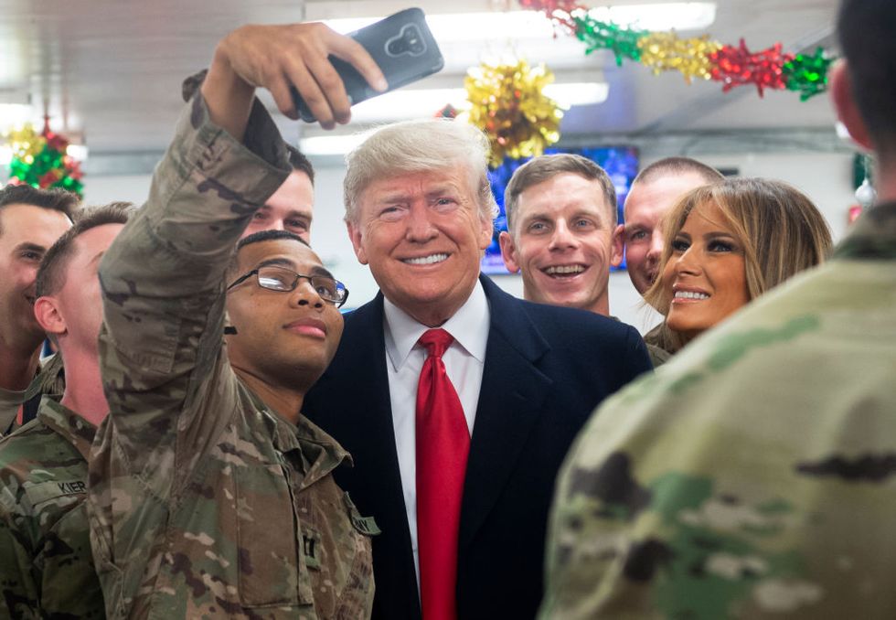 Donald Trump Is Getting Called Out for Lying Directly to the Troops He Visited in Iraq About Their Pay