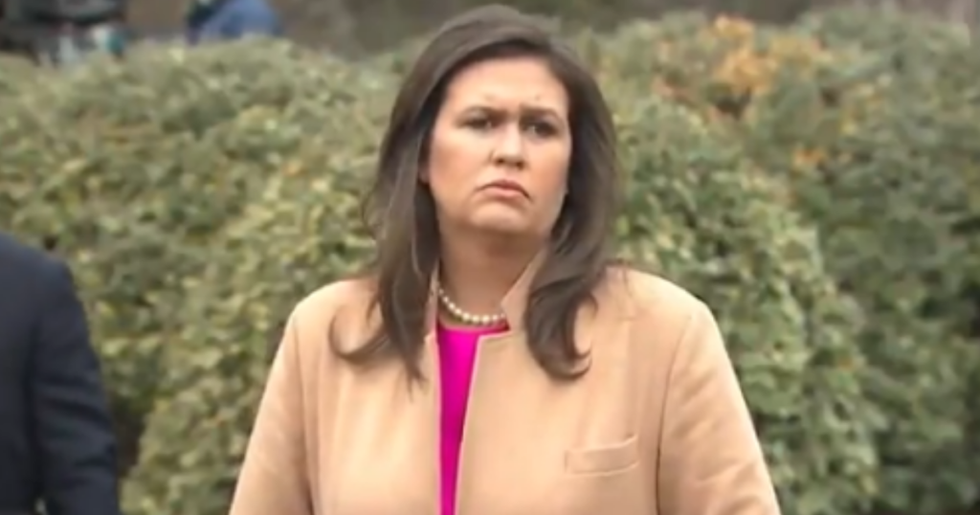 Sarah Sanders Was Just Asked If Trump Will Tone Down His Rhetoric After Journalists Were Targeted in Domestic Terror Plot, and Her Response Is Peak Sarah Sanders