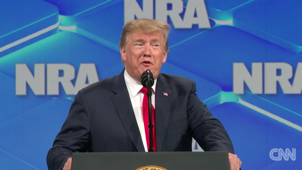 Donald Trump Just Creepily Acted Out the Paris Terrorist Attack Using His Hand as a Gun to Make a Questionable Point About Loosening Gun Laws