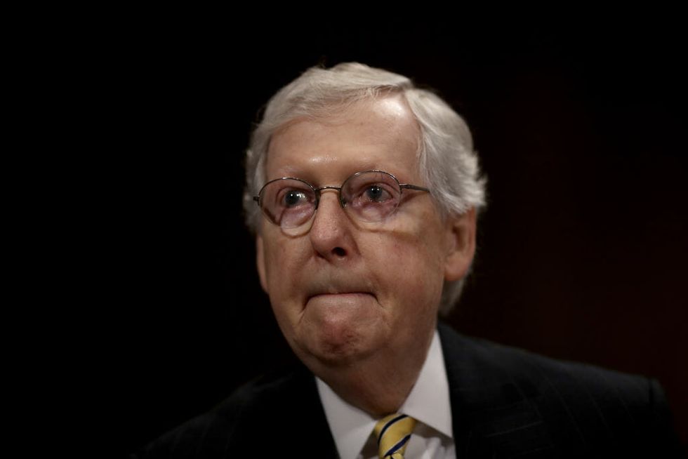 Mitch McConnell's Campaign Is Getting Called Out for Its Morbid Display of Gravestones With Political Foes' Names on Them