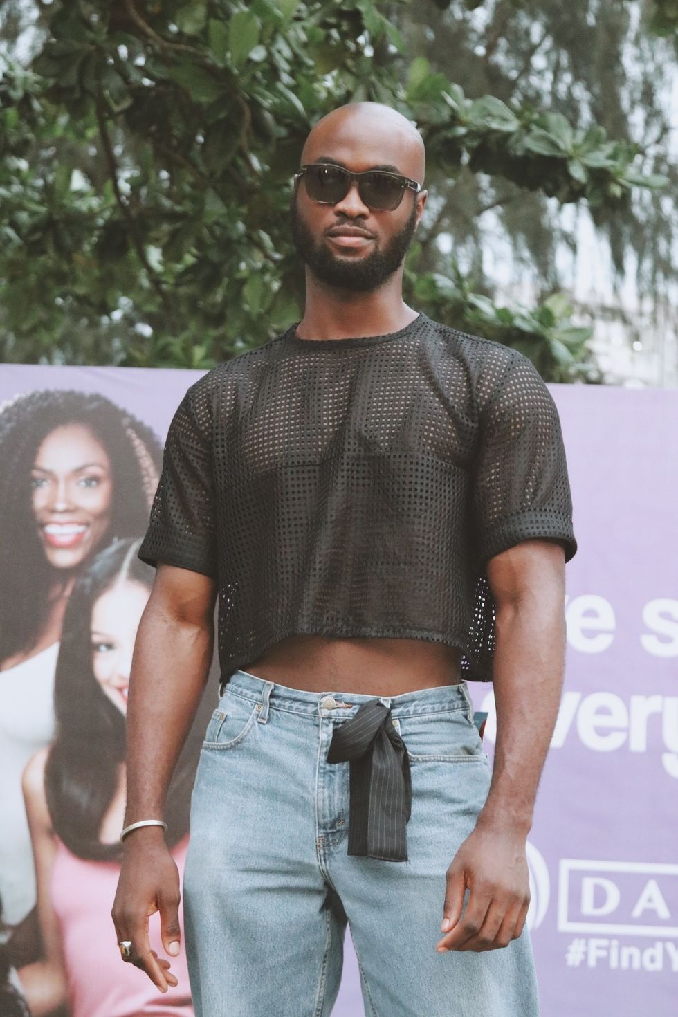 Nigerian man wearing mesh shirt during Lagos Fashion Week 2019