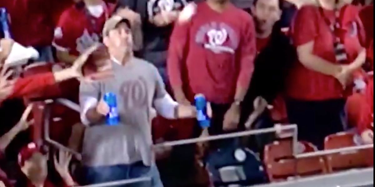 Too cold to hold!, Beer vendor during a baseball game at Bu…