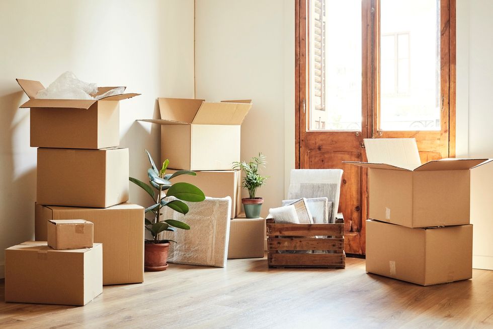 Stock image of house moving boxes