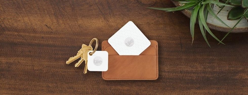 The Tile Slim tracker on a key ring and in a wallet