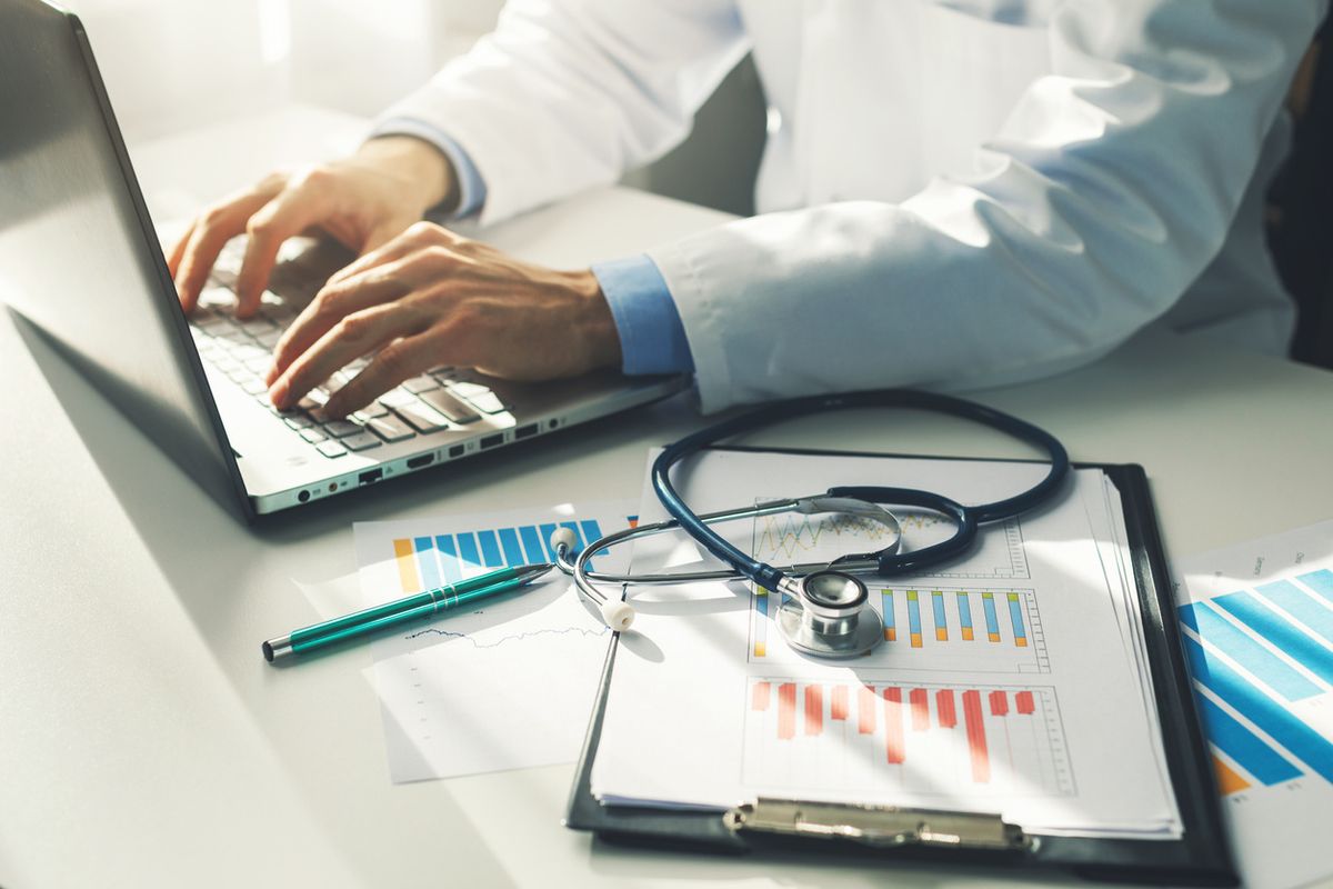 Stock image of a doctor using a computer