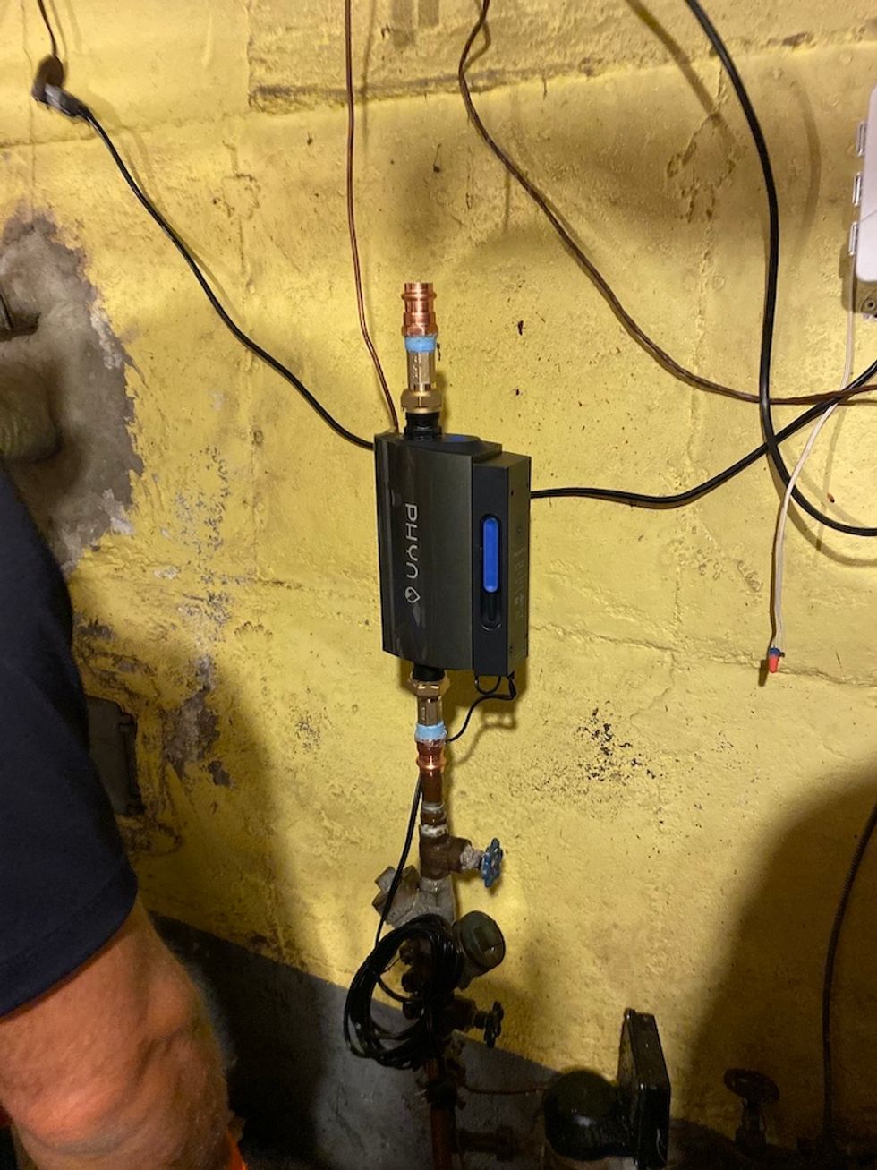 Photo of Phyn Plus installed on water main.