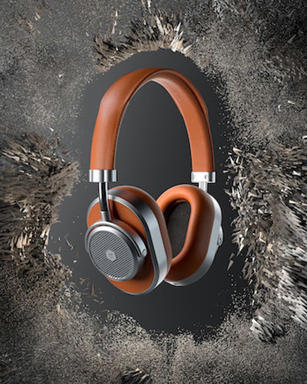 A pair of brown Master & Dynamic headphones
